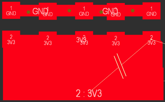 PCB view showing polygon pours with net labels: a top row of pads labeled GND and a large copper area labeled 3V3. A diagonal trace with a capacitor symbol connects into the 3V3 area, indicating a decoupling or net connection.