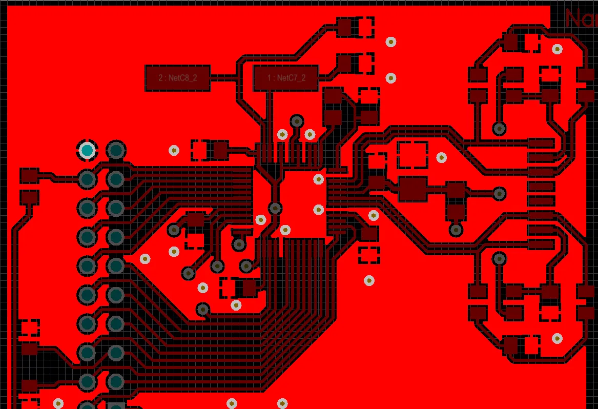 A polygon pour (brighter red) being used to create a large GND area on a board A polygon pour (brighter red) being used to create a large GND area on a board